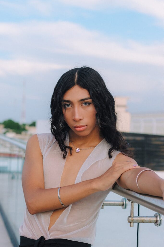portrait of man with long black hair