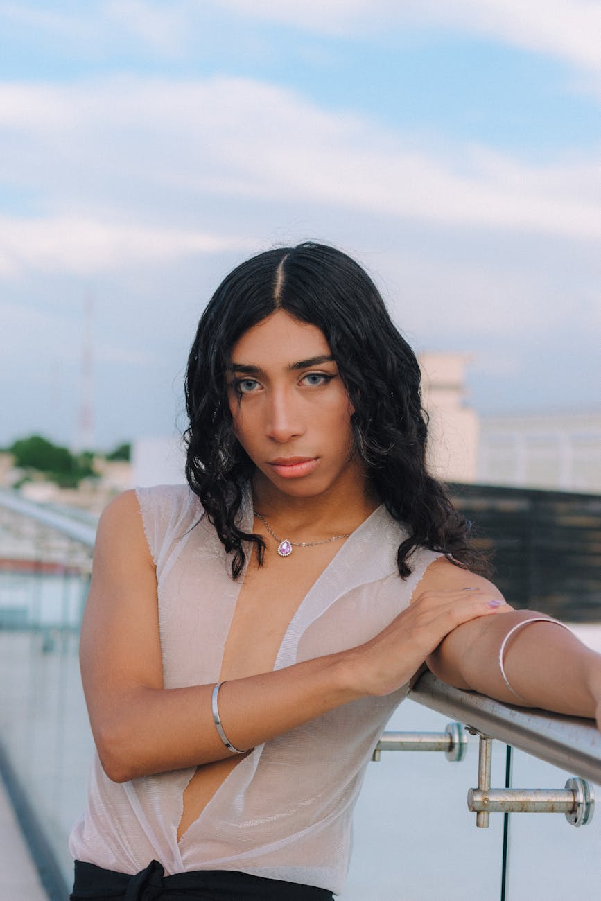 portrait of man with long black hair