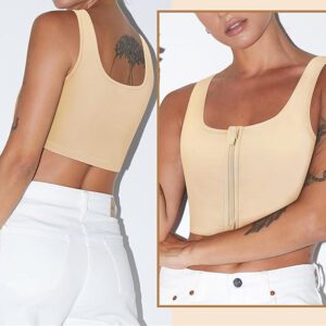 A person wearing a beige zipper chest binder and white jeans. They have tattoos on their arms and a tree tattoo on their back. The image is divided, showing them from the back on the left and a close-up of their front on the right.